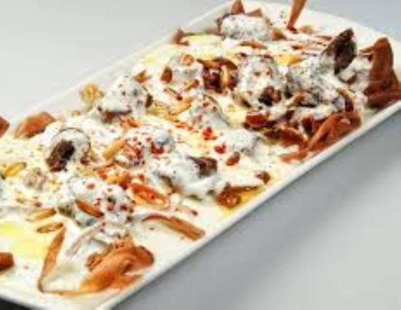 طريقة عمل فتة الباذنجان بالأرز والزبادي طريقة عمل فتة الباذنجان